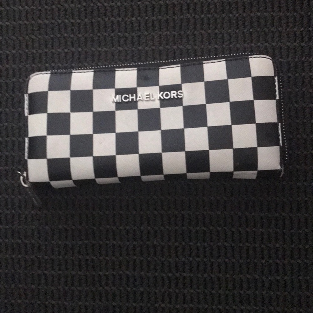 A gently used Michael Kors wallet